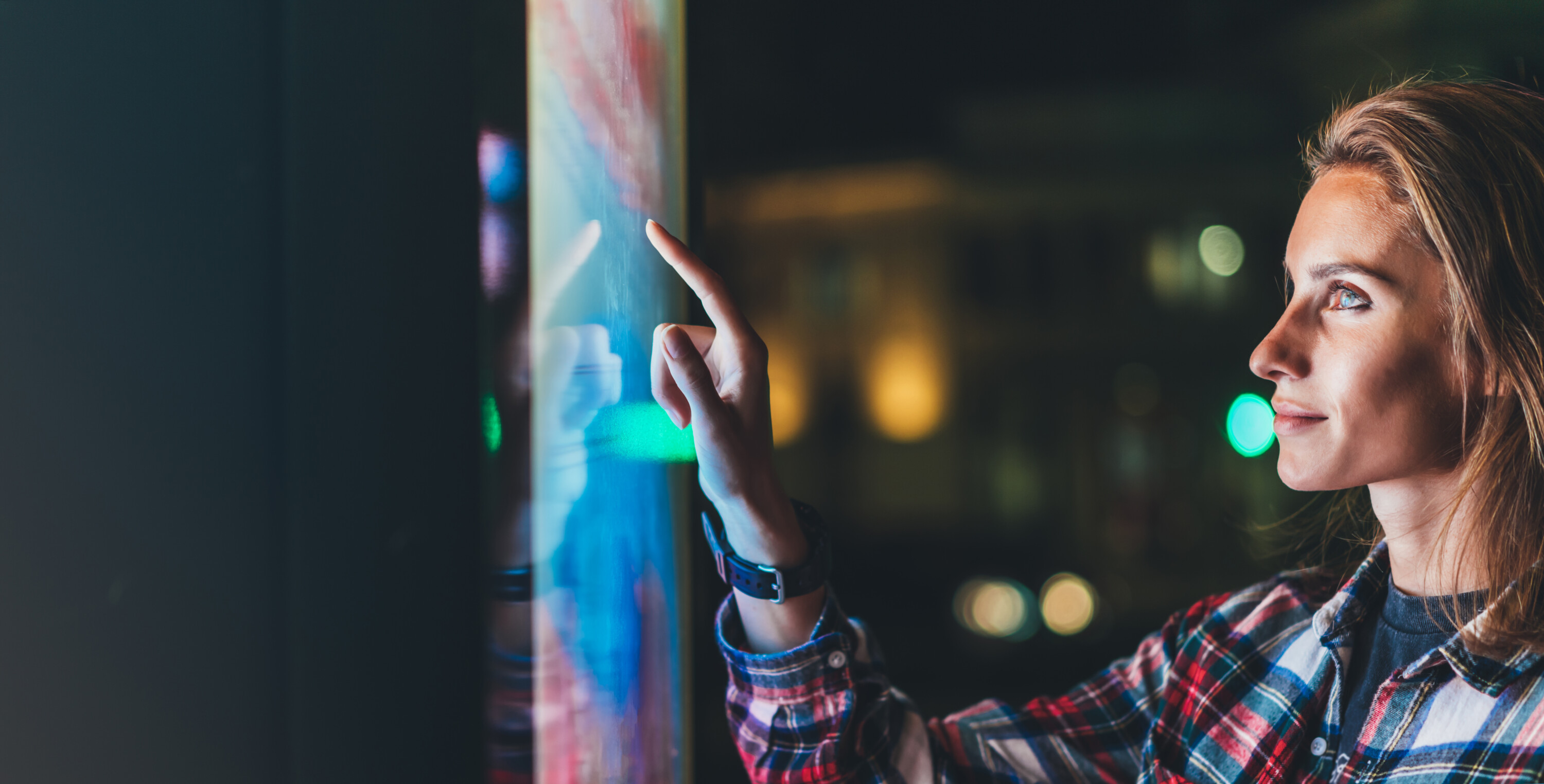 girl pointing finger to blank monitor display, hipster touch mul