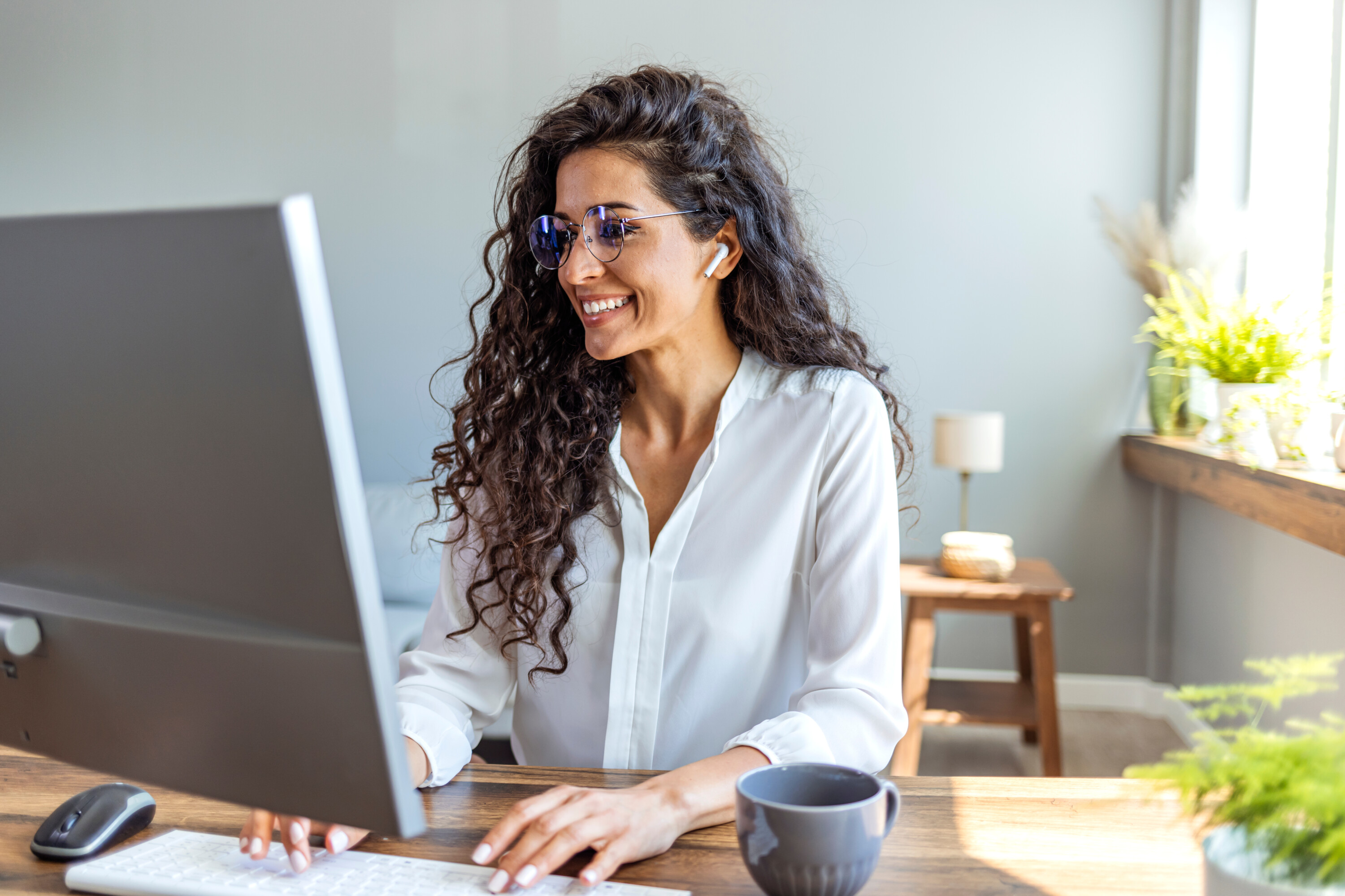 Shot of a young businesswoman working on a computer in an office