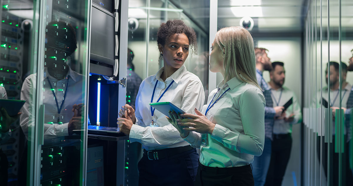 women working together on a server