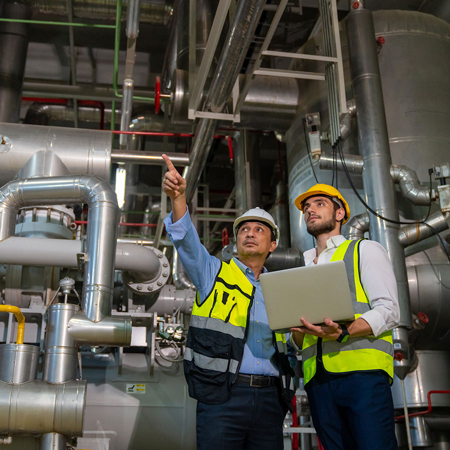 two managers in factory