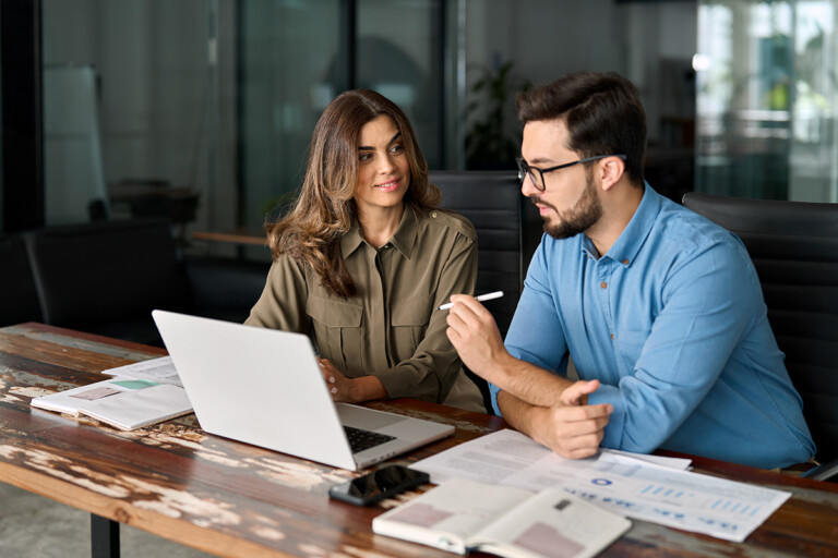 colleagues working together in office