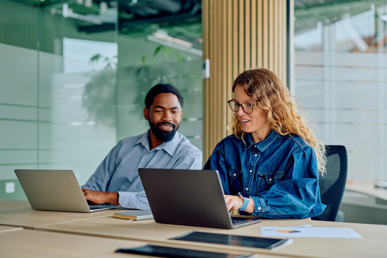 colleagues working in partnership on platform